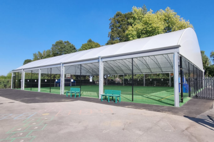 Picture shows vast MUGA sports area and its new roof