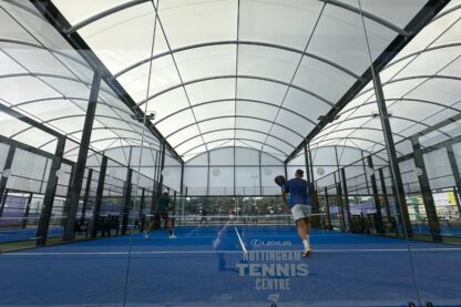 Picture shows someone play padel inside the newly built padel court