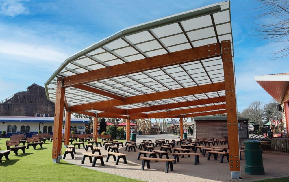 Picture shows a huge covered showstand area, two covered outdoor dining and picnic areas,.