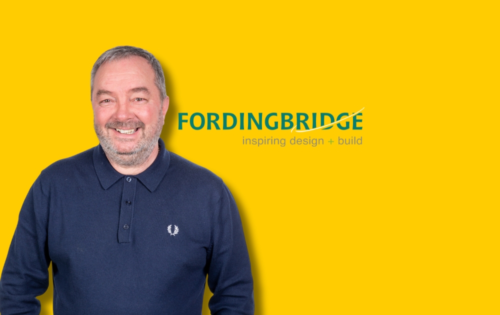 Picture shows Chris on a Yellow background