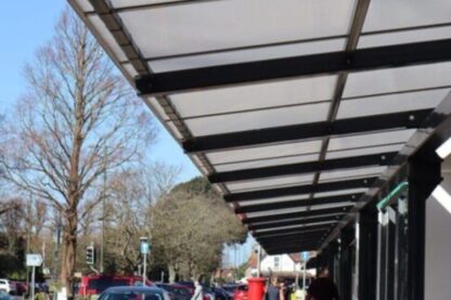 Picture shows Rustington town centre and a retail canopies that run the full length of both sides of the high street