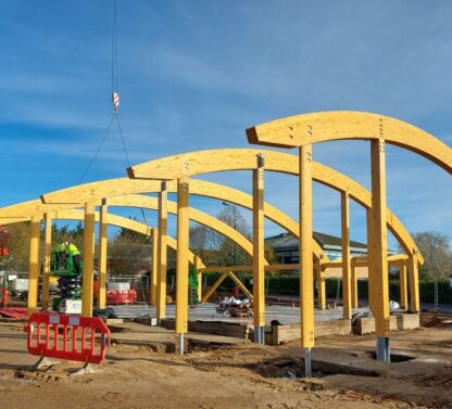 Picture shows timber frame structure going up at Norwich Costa