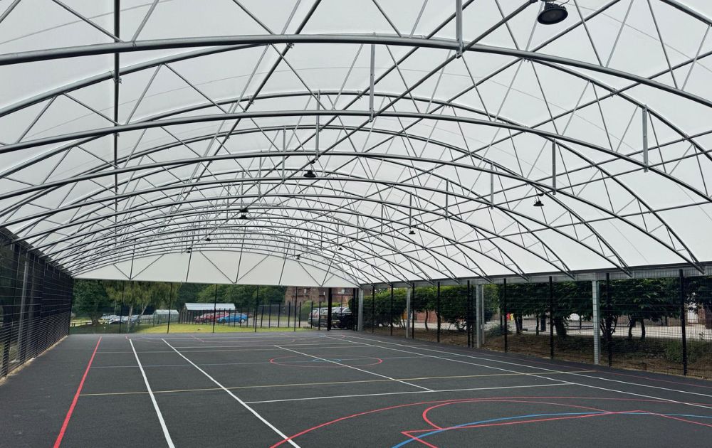 Picture show new MUGA area with the canopy covered sports area