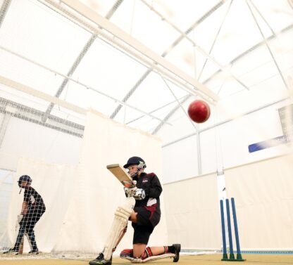 Picture shows boys playing cricket under the new canopy at Darwen Cricket Club