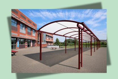 Covered school walkway at Dean Trust Wigan, providing a sheltered all-weather route between buildings and improving movement around the school campus.
