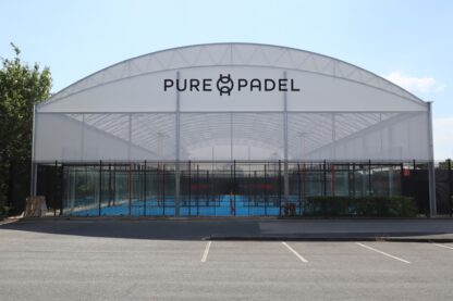 Exterior view of Pure Padel York showing the Fordingbridge all-weather canopy covering four padel courts.